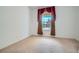 Bright bedroom featuring neutral carpet and ornamental window treatments at 8431 Jeremiah Grove St, Las Vegas, NV 89123