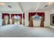 Open living space featuring carpet floors, multiple windows, and a fireplace at 8431 Jeremiah Grove St, Las Vegas, NV 89123