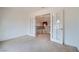 Carpeted office space with French doors leading to an open loft area at 8431 Jeremiah Grove St, Las Vegas, NV 89123