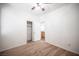 Bedroom features neutral carpet, a closet, and an entrance to the hallway at 8564 Lost Gold Ave, Las Vegas, NV 89129