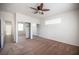 Bright bedroom featuring mirrored closet doors and neutral colored carpet at 8564 Lost Gold Ave, Las Vegas, NV 89129