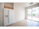 Kitchen breakfast nook area with tile flooring and backyard access at 8564 Lost Gold Ave, Las Vegas, NV 89129