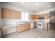 Well-lit kitchen with stainless steel appliances and ample counter space at 8564 Lost Gold Ave, Las Vegas, NV 89129