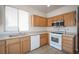 Functional kitchen with a dishwasher, microwave, and gas range at 8564 Lost Gold Ave, Las Vegas, NV 89129