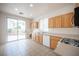 Bright kitchen with stainless steel appliances and sliding glass doors at 8564 Lost Gold Ave, Las Vegas, NV 89129