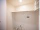 Practical laundry room with ample storage space and utility connections at 8564 Lost Gold Ave, Las Vegas, NV 89129