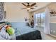 Well-decorated bedroom featuring a comfy bed and a window with great outdoor light at 890 Socorro Song Ln, Henderson, NV 89052