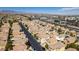 Neighborhood aerial view showing street layout, landscaping and community amenities at 9476 Milkweed Canyon Ave, Las Vegas, NV 89166
