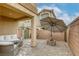 Spacious backyard with cozy seating, and lush greenery, perfect for relaxation at 9535 Vega Carpio Ave, Las Vegas, NV 89178