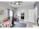 Themed bedroom with accent decor and adjoining walk-in closet at 9535 Vega Carpio Ave, Las Vegas, NV 89178