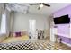 Bright bedroom with unique ceiling, fan, and updated features at 9535 Vega Carpio Ave, Las Vegas, NV 89178