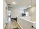 Open loft area with neutral walls and flooring is perfect for a workout area or study space at 9535 Vega Carpio Ave, Las Vegas, NV 89178