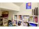 Organized storage room with shelving and ample space at 9535 Vega Carpio Ave, Las Vegas, NV 89178