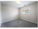 This cozy bedroom has neutral paint, carpet, a window for natural light, and electrical outlets at 9750 Maple Sugar Leaf Pl, Las Vegas, NV 89148