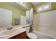 Bathroom features neutral paint, a mirror, and a white shower/tub combination at 10241 Premia Pl, Las Vegas, NV 89135