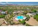 Aerial view of a community pool, surrounded by lush landscaping, creating a relaxing and luxurious atmosphere at 10241 Premia Pl, Las Vegas, NV 89135