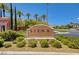 Siena community entrance sign with beautiful landscaping and stone features at 10241 Premia Pl, Las Vegas, NV 89135