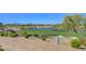 Picturesque golf course with a serene pond, lush greenery, and mature trees at 10241 Premia Pl, Las Vegas, NV 89135