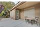 Cozy covered patio area with seating, perfect for enjoying outdoor relaxation and fresh air at 10241 Premia Pl, Las Vegas, NV 89135
