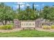 Welcome to Siena, community sign with manicured landscaping and stone details at 10241 Premia Pl, Las Vegas, NV 89135