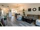 Inviting living room boasts new flooring and connects to the kitchen, ideal for modern living at 10500 Pine Pointe Ave # 206, Las Vegas, NV 89144