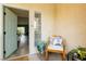 Relaxing sitting area with comfortable chair and accent table, perfect for enjoying outdoor views at 10500 Pine Pointe Ave # 206, Las Vegas, NV 89144