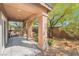 Backyard covered patio featuring desert landscaping for outdoor relaxation and entertaining at 10858 Morning Frost St, Las Vegas, NV 89179