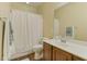 Clean bathroom with shower-tub combo, vanity, and neutral color scheme at 10858 Morning Frost St, Las Vegas, NV 89179