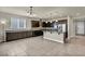 Eat-in kitchen includes stainless steel appliances, granite countertops, and center island at 1108 Via Della Curia, Henderson, NV 89011