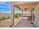 Enjoy this covered patio with brick flooring and ceiling fan overlooking a low-maintenance yard at 1108 Via Della Curia, Henderson, NV 89011