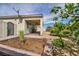 Covered patio area, ideal for relaxing and enjoying the serene outdoor space at 1108 Via Della Curia, Henderson, NV 89011