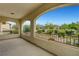 Spacious balcony with views of the lush landscaping and mountains beyond, perfect for relaxing outdoors at 12122 High Country Ln, Las Vegas, NV 89138