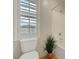 Bathroom featuring toilet, shower and window at 12122 High Country Ln, Las Vegas, NV 89138