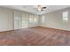 Bright, spacious bedroom featuring large windows and sliding glass doors to let in natural light at 12122 High Country Ln, Las Vegas, NV 89138