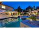 Stunning backyard pool and spa area with lush landscaping and stylish tile work, ideal for relaxation at 12122 High Country Ln, Las Vegas, NV 89138