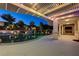 Gorgeous pool with landscaped yard, a pergola with string lights, and an outdoor entertainment area at 12122 High Country Ln, Las Vegas, NV 89138