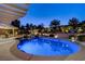 Inground pool and spa with patio, lighting and landscaping at 12122 High Country Ln, Las Vegas, NV 89138