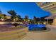 Sparkling pool with an attached spa and a landscaped patio area, perfect for relaxation and enjoyment at 12122 High Country Ln, Las Vegas, NV 89138