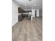 This kitchen features granite counters, modern appliances, and tile floors at 138 Scarlett View Ave, North Las Vegas, NV 89031