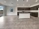 This kitchen features granite counters, modern appliances, and a large island at 138 Scarlett View Ave, North Las Vegas, NV 89031