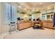 Bathroom with ample vanity storage and large, bright mirrors at 1508 Ten Palms Ct, Las Vegas, NV 89117