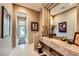 The bathroom includes a stone countertop and access to the backyard through a glass door at 1508 Ten Palms Ct, Las Vegas, NV 89117