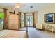 Bedroom with private backyard access and bright, neutral decor at 1508 Ten Palms Ct, Las Vegas, NV 89117