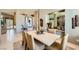 Inviting dining room featuring a marble table, stylish decor, and natural light at 1508 Ten Palms Ct, Las Vegas, NV 89117