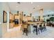 Spacious kitchen with a center island, breakfast bar, and open access to the living area at 1508 Ten Palms Ct, Las Vegas, NV 89117