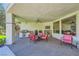 The outdoor kitchen is located on the covered patio and features a built-in grill and countertop space at 1508 Ten Palms Ct, Las Vegas, NV 89117