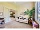 Relaxing sitting room with high ceiling, comfortable seating, and natural light at 1508 Ten Palms Ct, Las Vegas, NV 89117