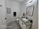 Well-lit bathroom with modern fixtures, a vessel sink, and a minimalist design for a clean and fresh feel at 1830 N Buffalo Dr # 1091, Las Vegas, NV 89128