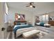 Bedroom with hardwood floors, large mirror closet, and well-lit interior at 1830 N Buffalo Dr # 1091, Las Vegas, NV 89128