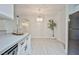 Dining room area features modern pendant lighting, neutral paint, and sleek, modern decor at 1830 N Buffalo Dr # 1091, Las Vegas, NV 89128